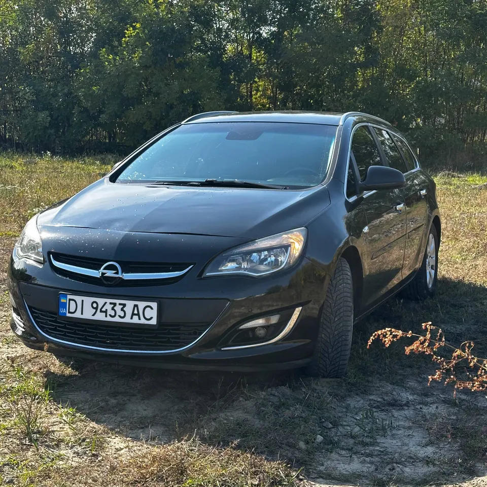 Opel Astra J — фото 2