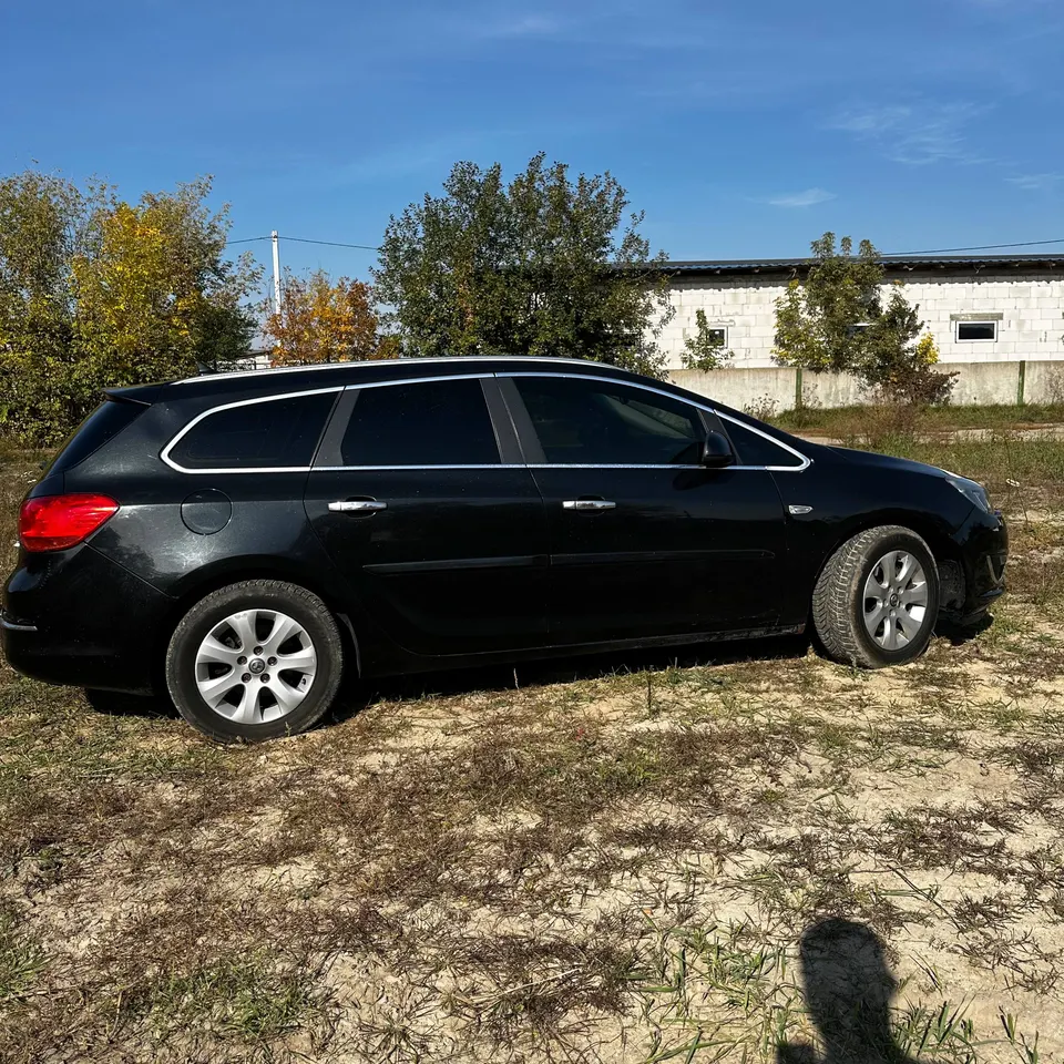 Opel Astra J — фото 3