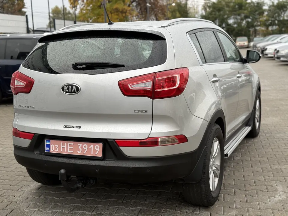 Kia Sportage — фото 7