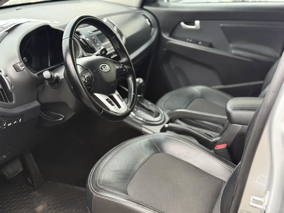 Kia Sportage — фото 10