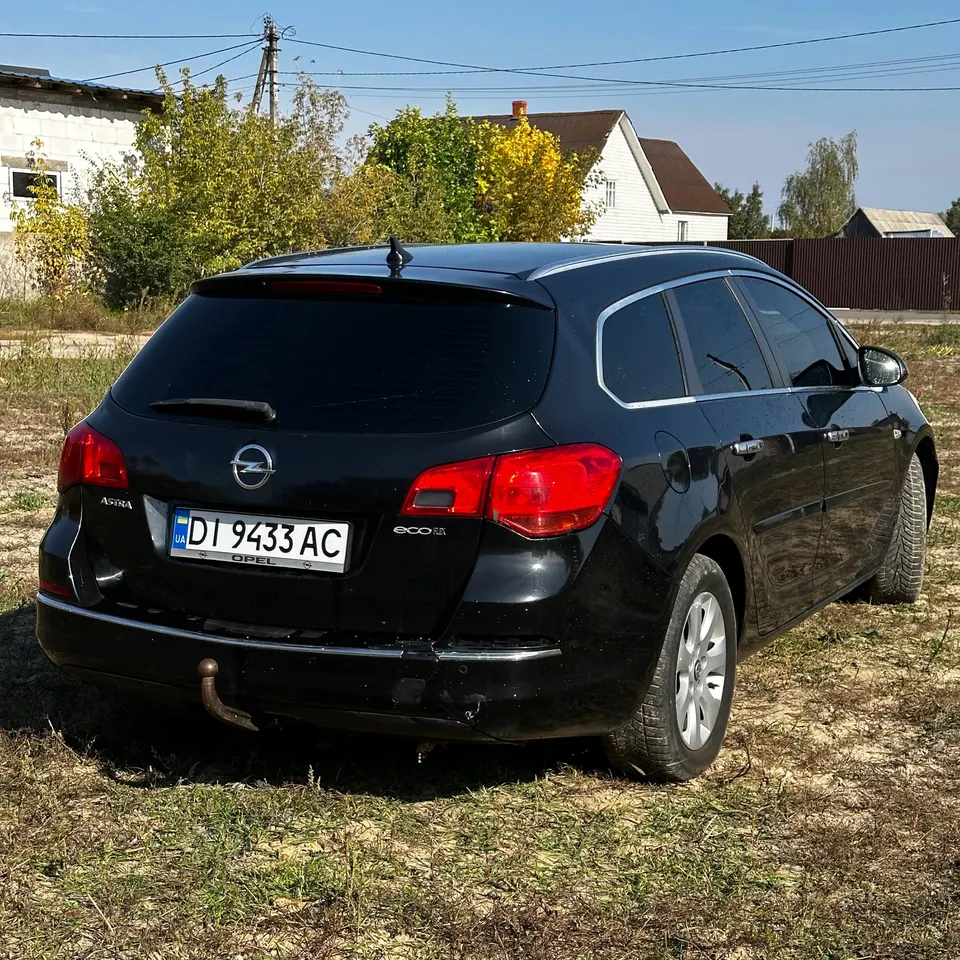 Opel Astra J — фото 4