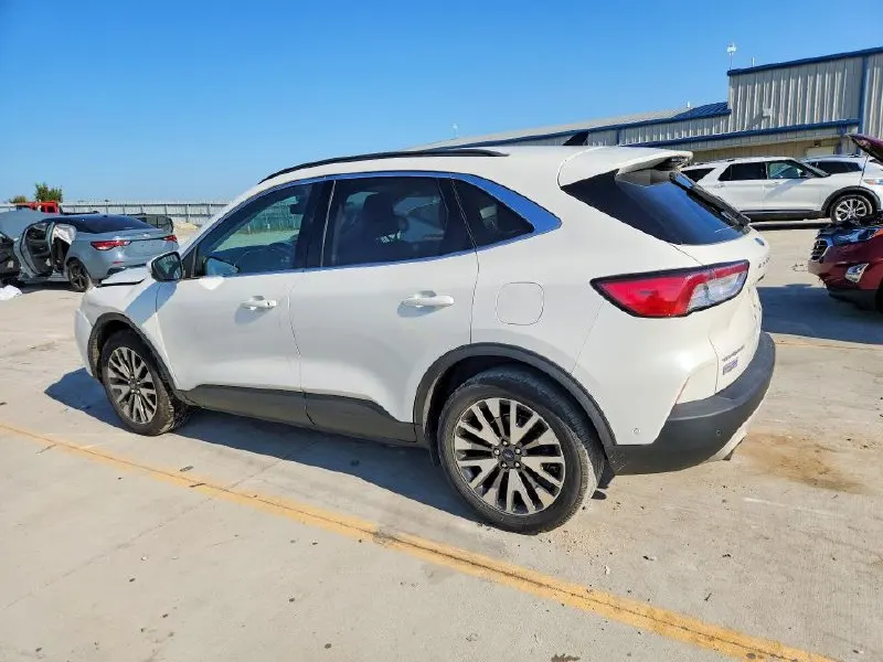 Ford ESCAPE TITANIUM HYBRID — фото 4