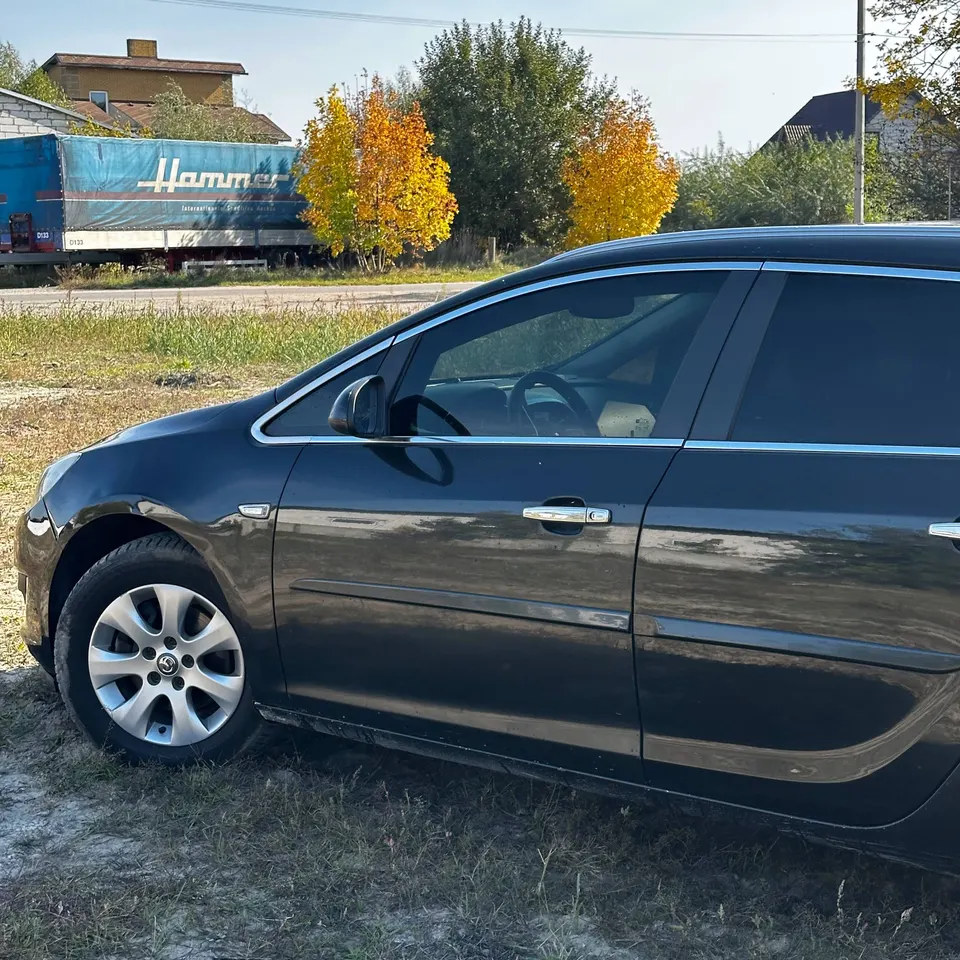 Opel Astra J — фото 6