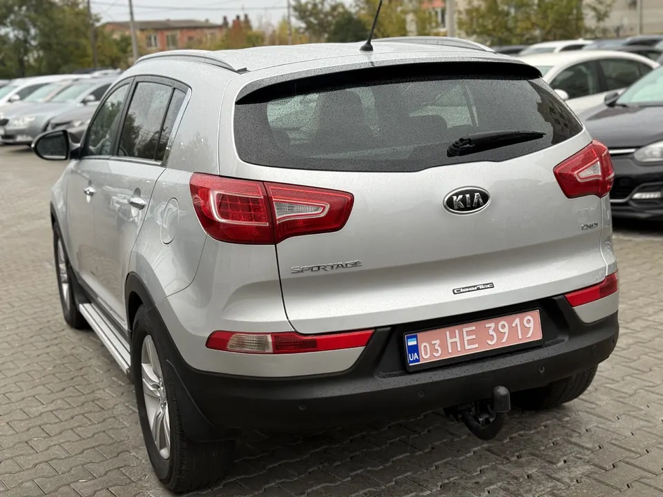 Kia Sportage — фото 9